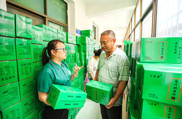 湖南  郴州  资兴  州门司  格美 
 暴雨  山洪  泥石流  防汛救灾  灾后重建  乌米香姐  捐赠  乌叶奶香饼  非遗传承人  李启香