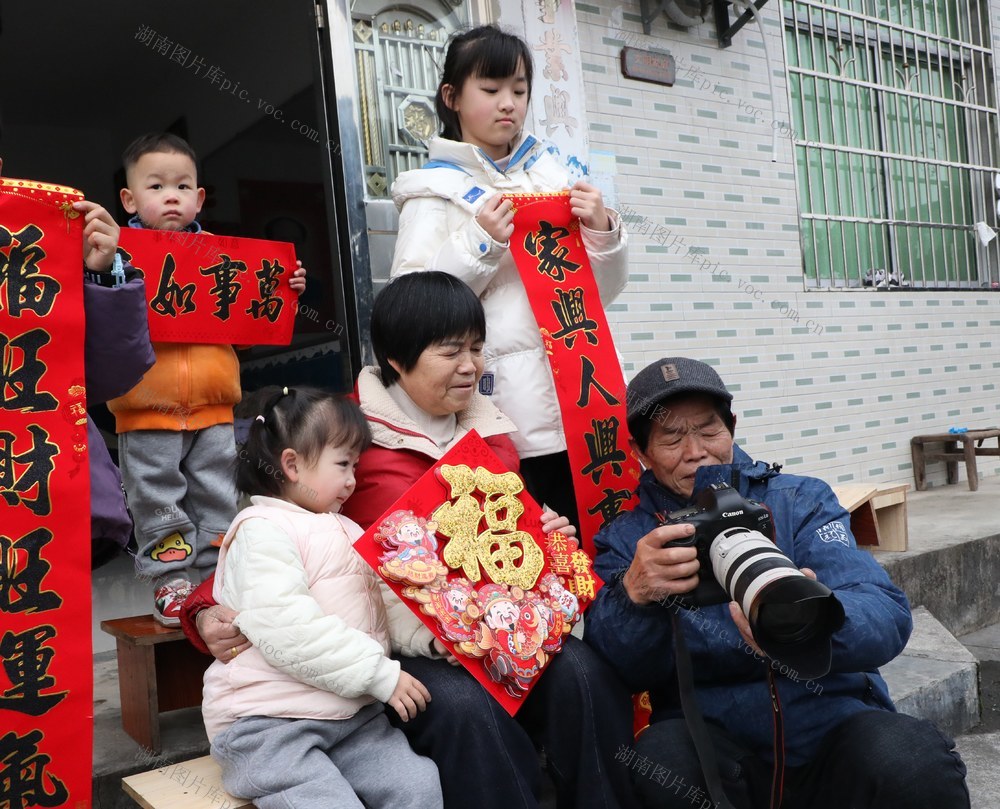 摄影进村寨    祝福送万家